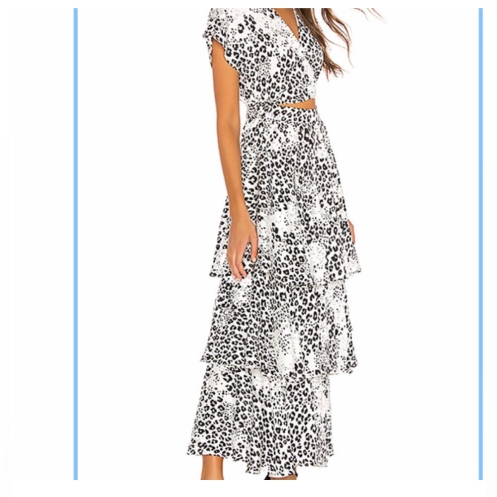 The Chante Midi Dress in
Black Leopard
L'Academie
Smoke free and pet free home